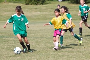 Emerald Dragons play soccer